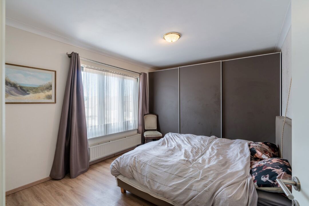 Ruim 2-slaapkamer appartement met ondergrondse parkeerplaats nabij het centrum van Neeroeteren.  foto 14