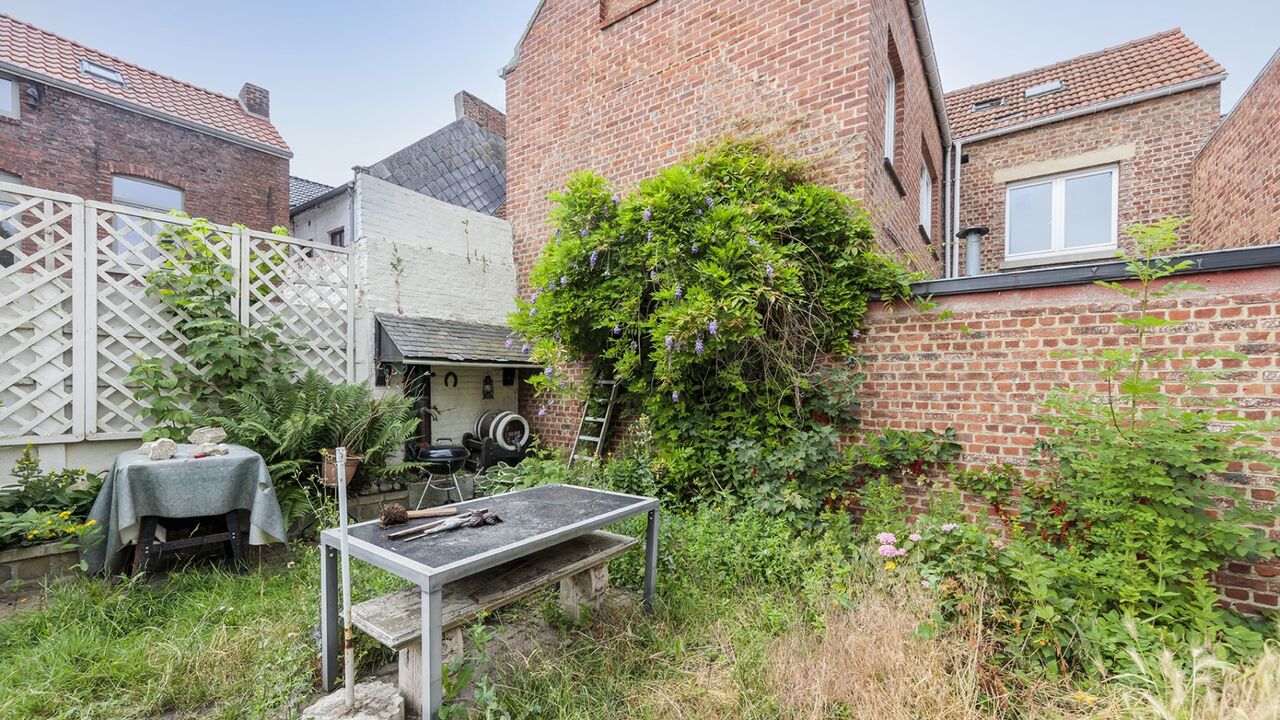Te renoveren gezinswoning met tuin in centrum Tienen foto 11