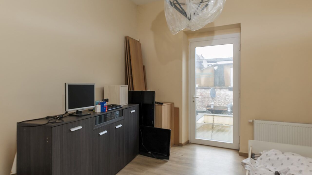 Handelszaak met duplex appartement in centrum Tienen foto 11