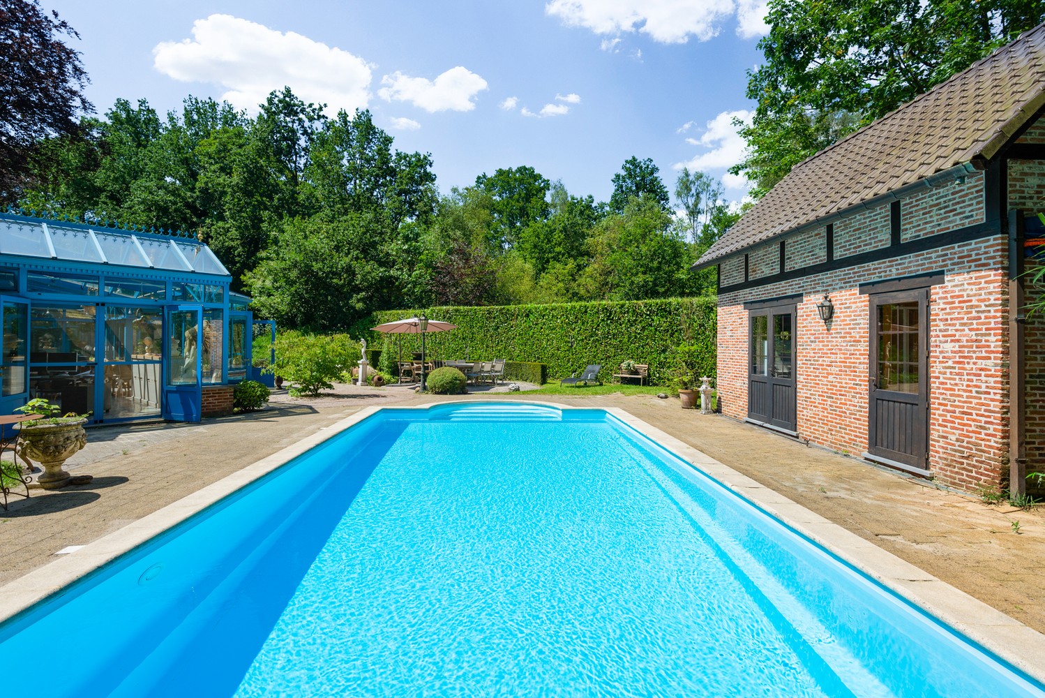 Op te frissen villa met zwembad op een aangenaam en zongericht perceel van 1720 m² op de grens van Zoersel / Schilde! foto 28
