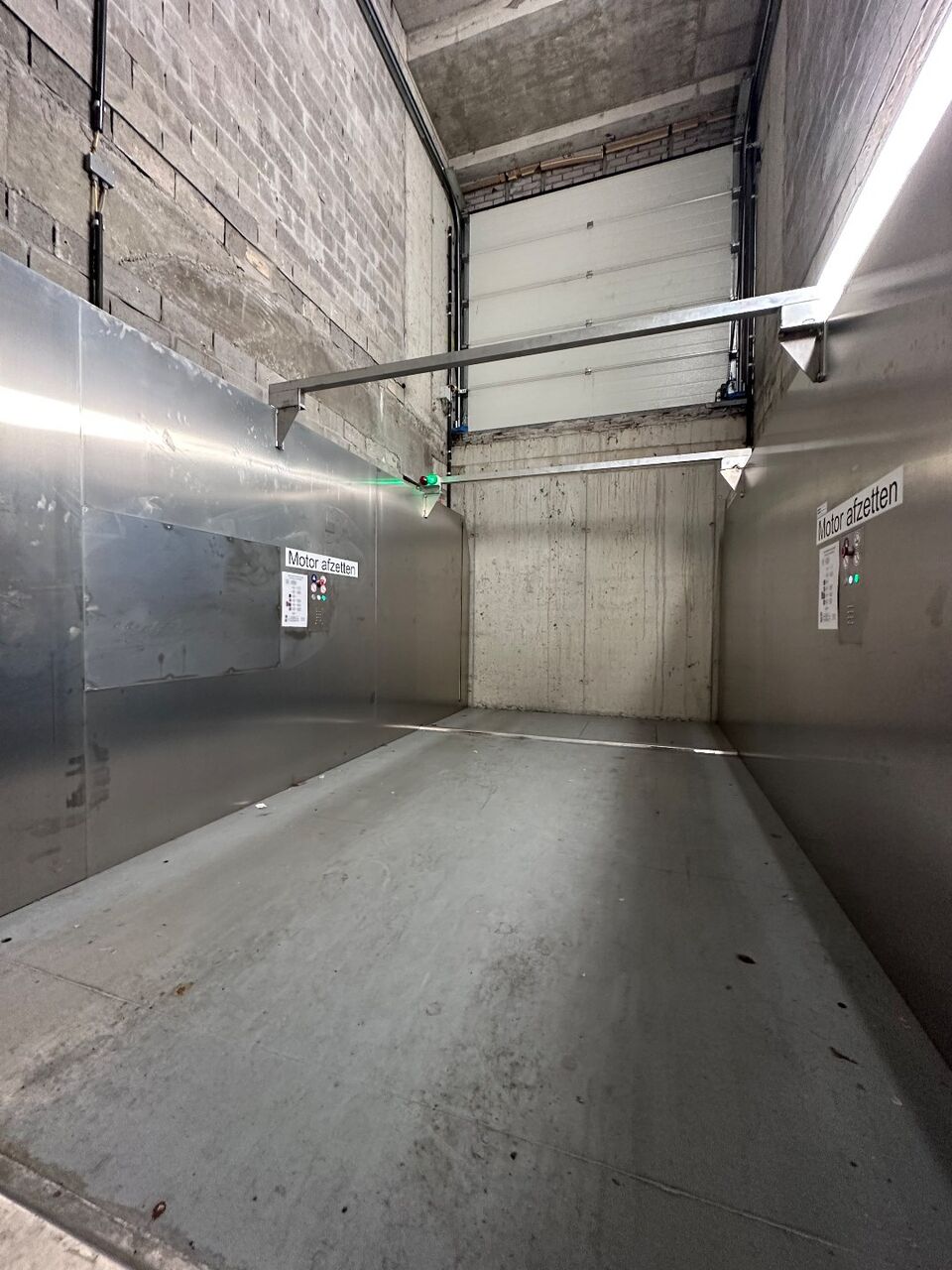 Ruime ondergrondse garage met autostaanplaats in het centrum van Gistel  foto 11