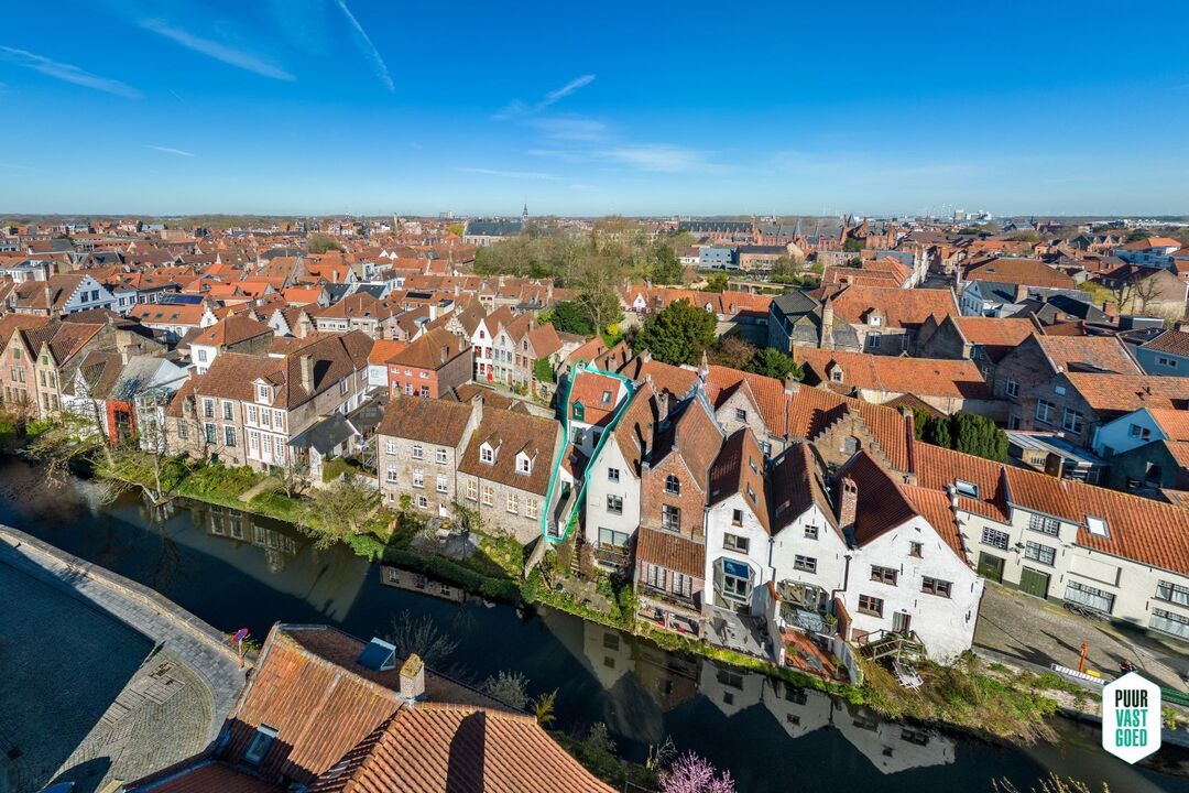 Grondig en duurzaam vernieuwde woning met zonneterras en zicht op de Reien in Brugge centrum! foto 9