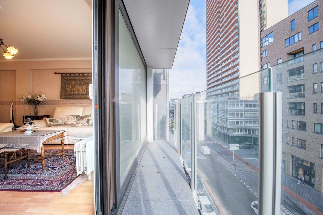 Lichtrijk 3 slpk appartement met een zonnig terras foto 2