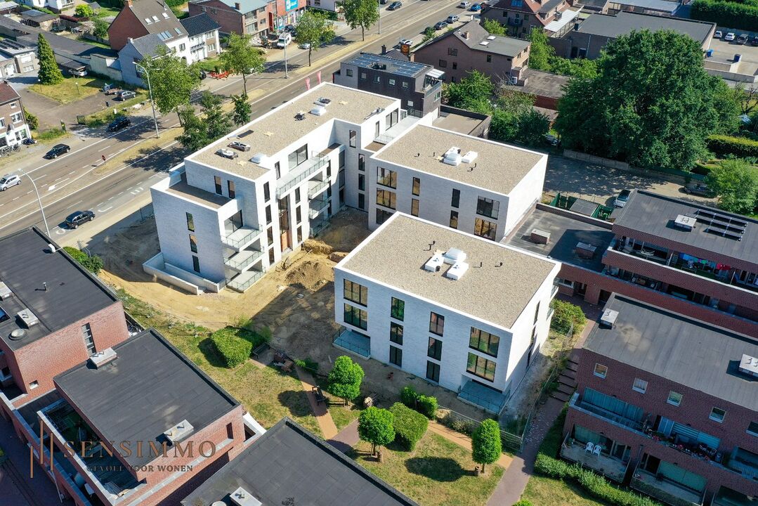 Prachtig en modern nieuwbouwproject met privatief terras/tuin + P + kelderberging te Maasmechelen foto 2