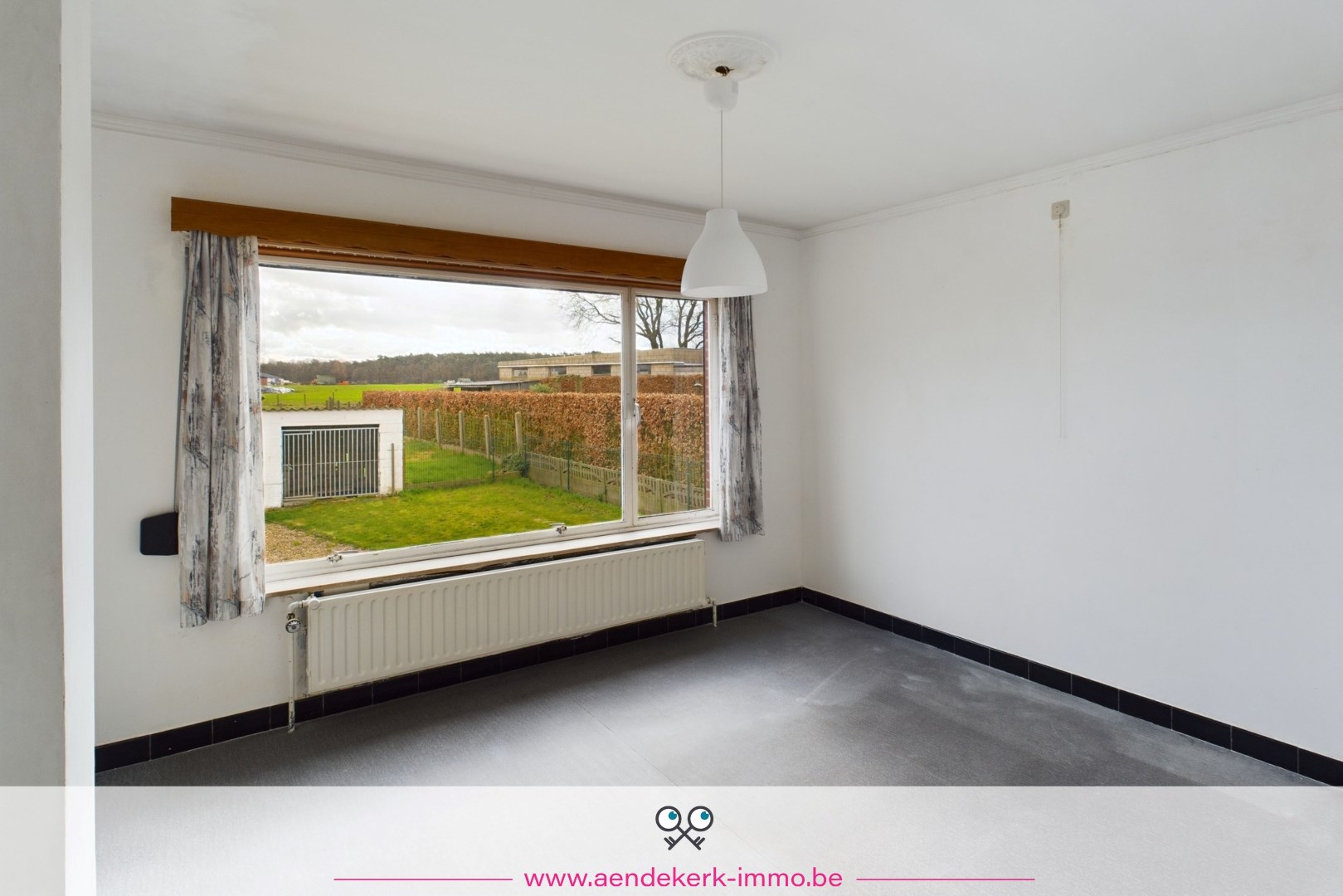 Lichtrijke split-levelwoning met drie slaapkamers in Neerglabbeek foto 12