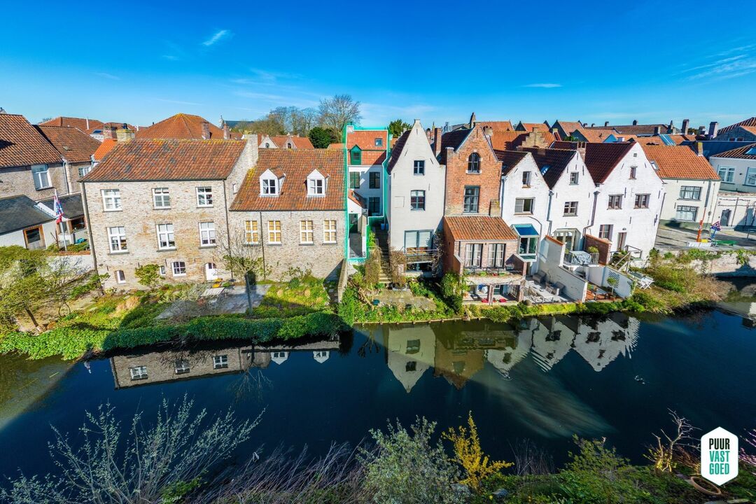 Grondig en duurzaam vernieuwde woning met zonneterras en zicht op de Reien in Brugge centrum! foto 10
