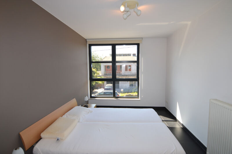 ​​​​Lichtrijk, modern 3-slaapkamerappartement met groot terras op 1e verdieping - incl garagebox te Mechelen. foto 14