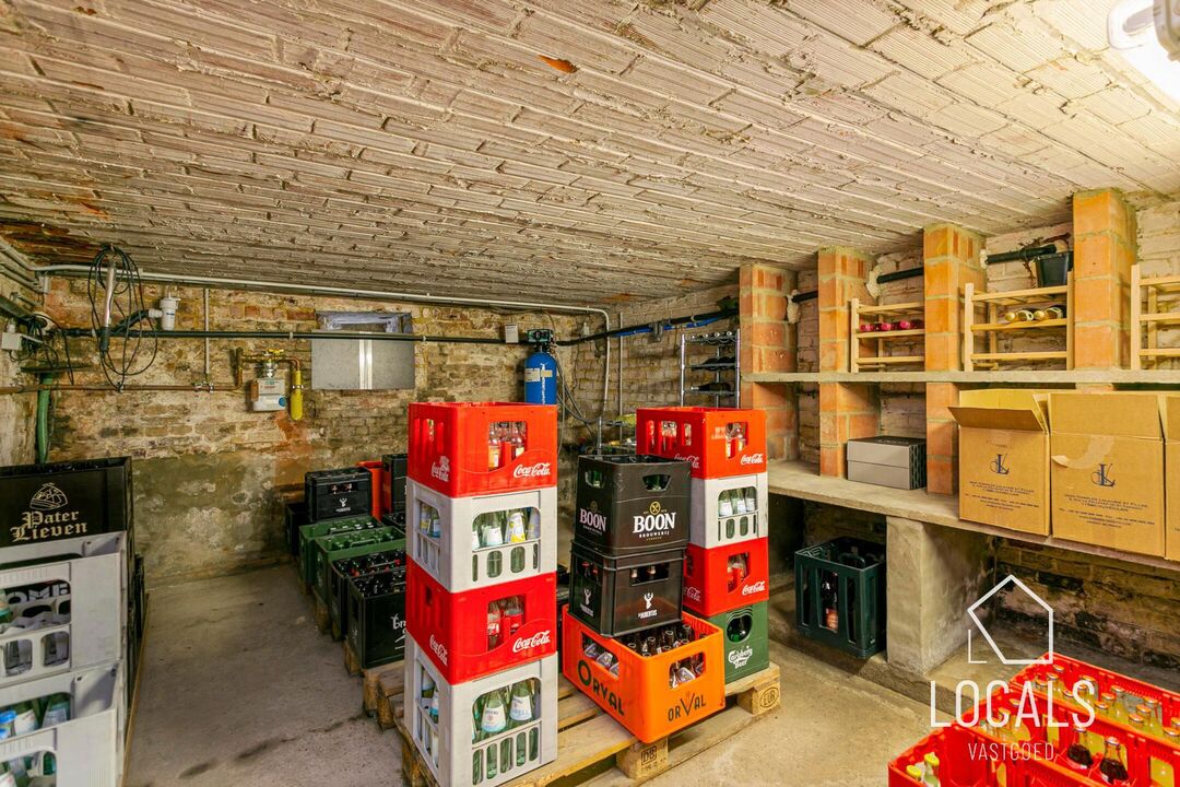 Multifunctioneel pand: handelsruimte, woonst & dubbele garage foto 33