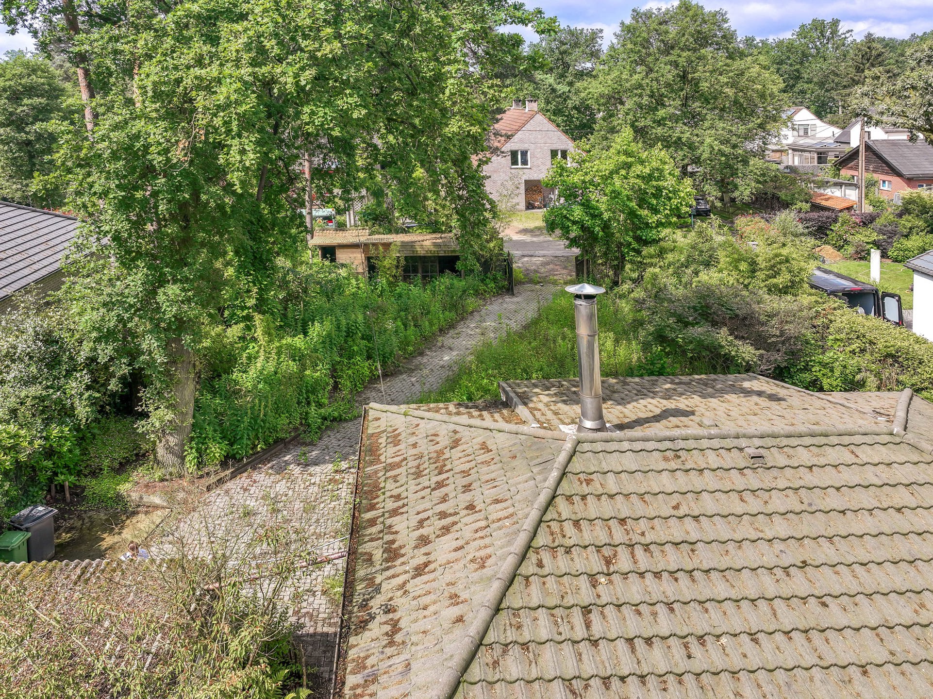 Te renoveren Woning met Exotische Tuin en Vele Mogelijkheden foto 29