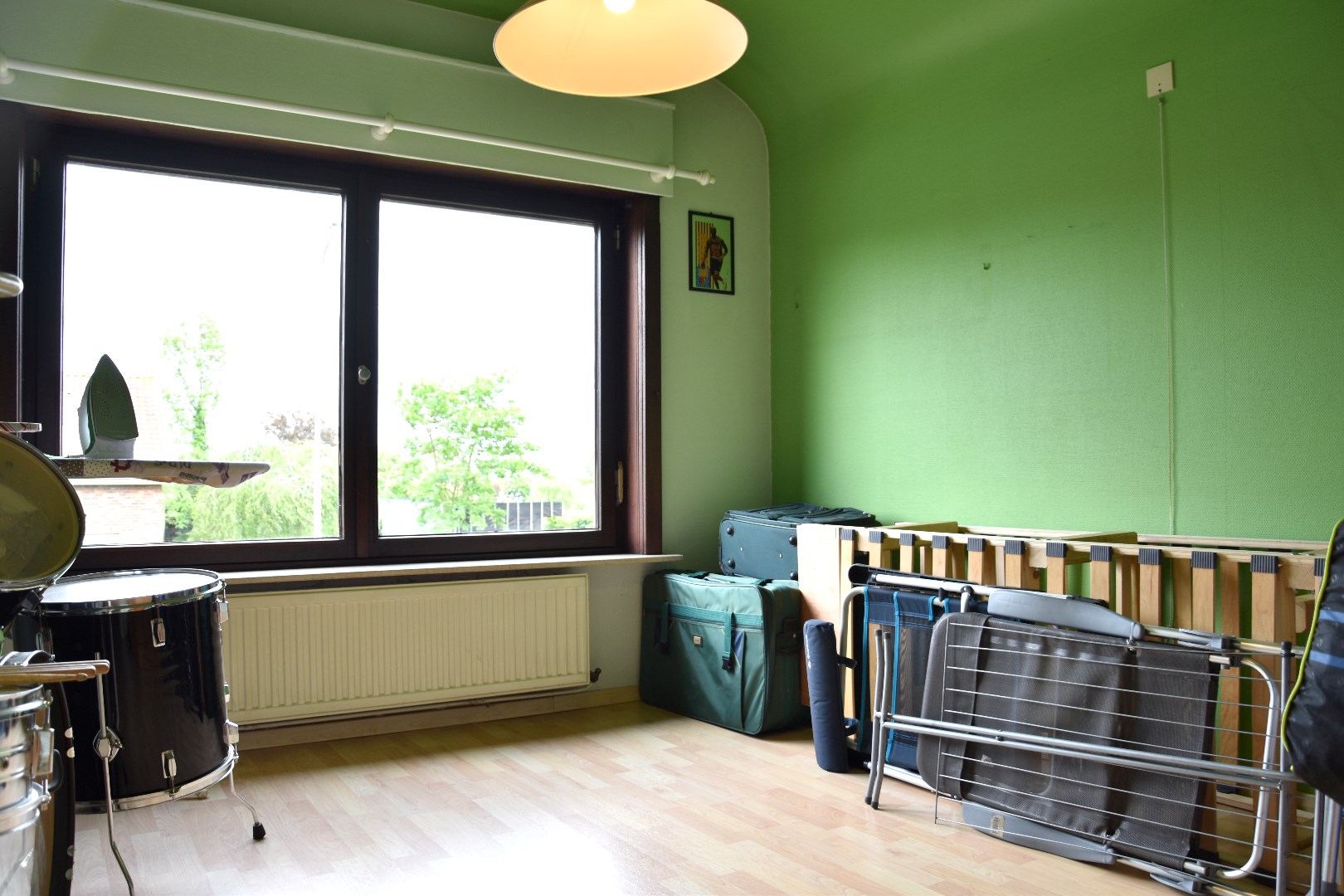 Goed onderhouden woning met 3 slaapkamers, garage en zonnige tuin te koop in Wevelgem foto 11