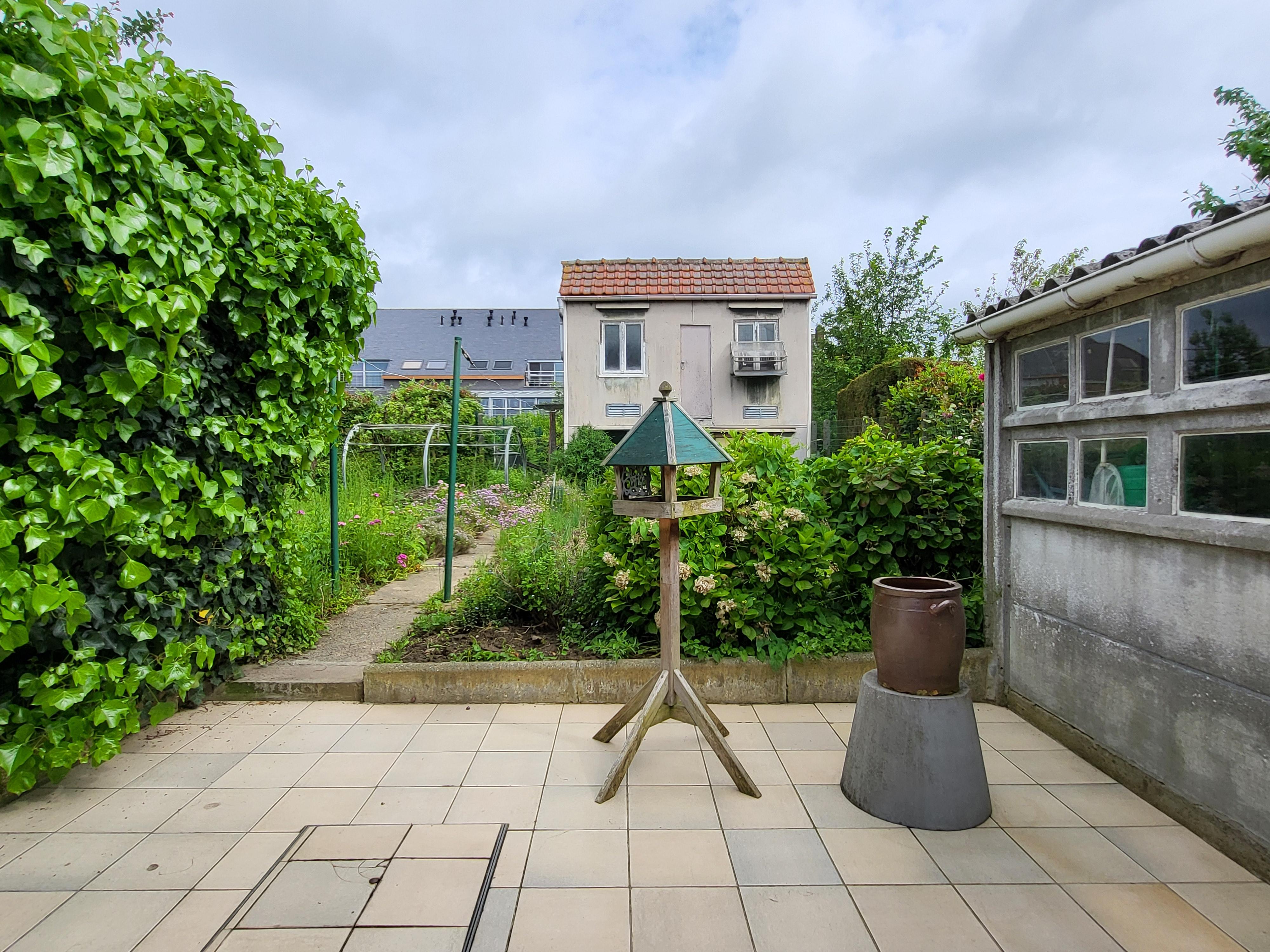 Charmante halfopen bebouwing met garage, zonnige tuin en terras. foto 21