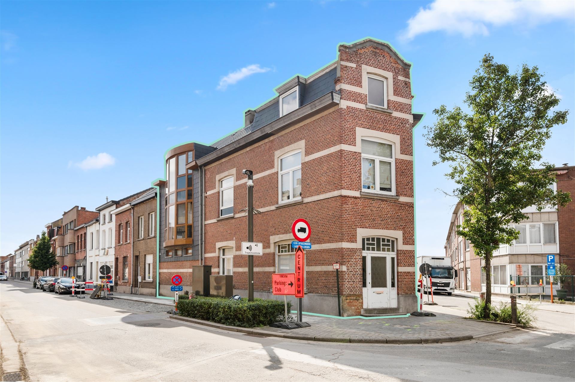 Opbrengsteigendom met 2 appartementen en een handelsruimte te Mechelen  foto 1