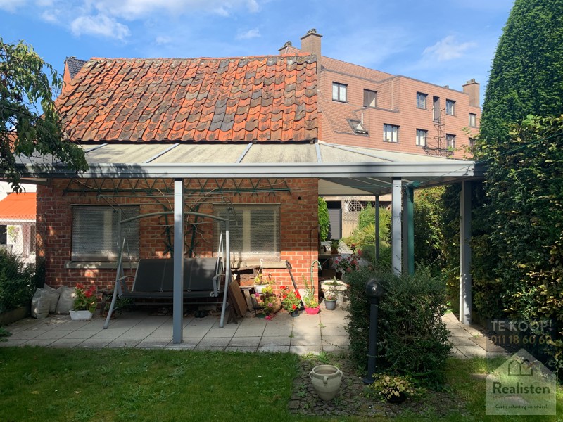 Ongewone woning met bijzonder grote tuin in het hartje van Diepenbeek foto 23
