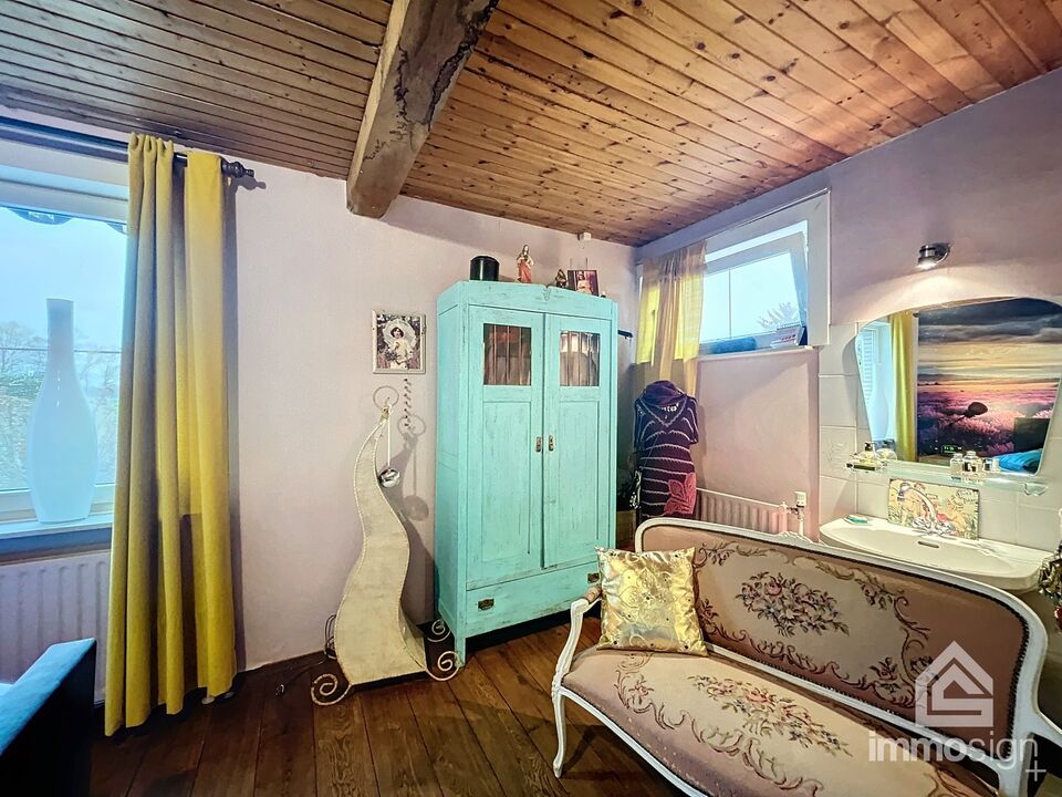 Gelijkvloerse woning met 4 slaapkamers in prachtige agrarische omgeving met optioneel extra weides foto 47