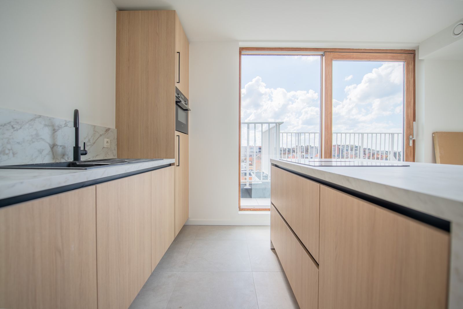Nieuwbouw penthouse appartement met zonnige terrassen in hartje Oostende foto 4