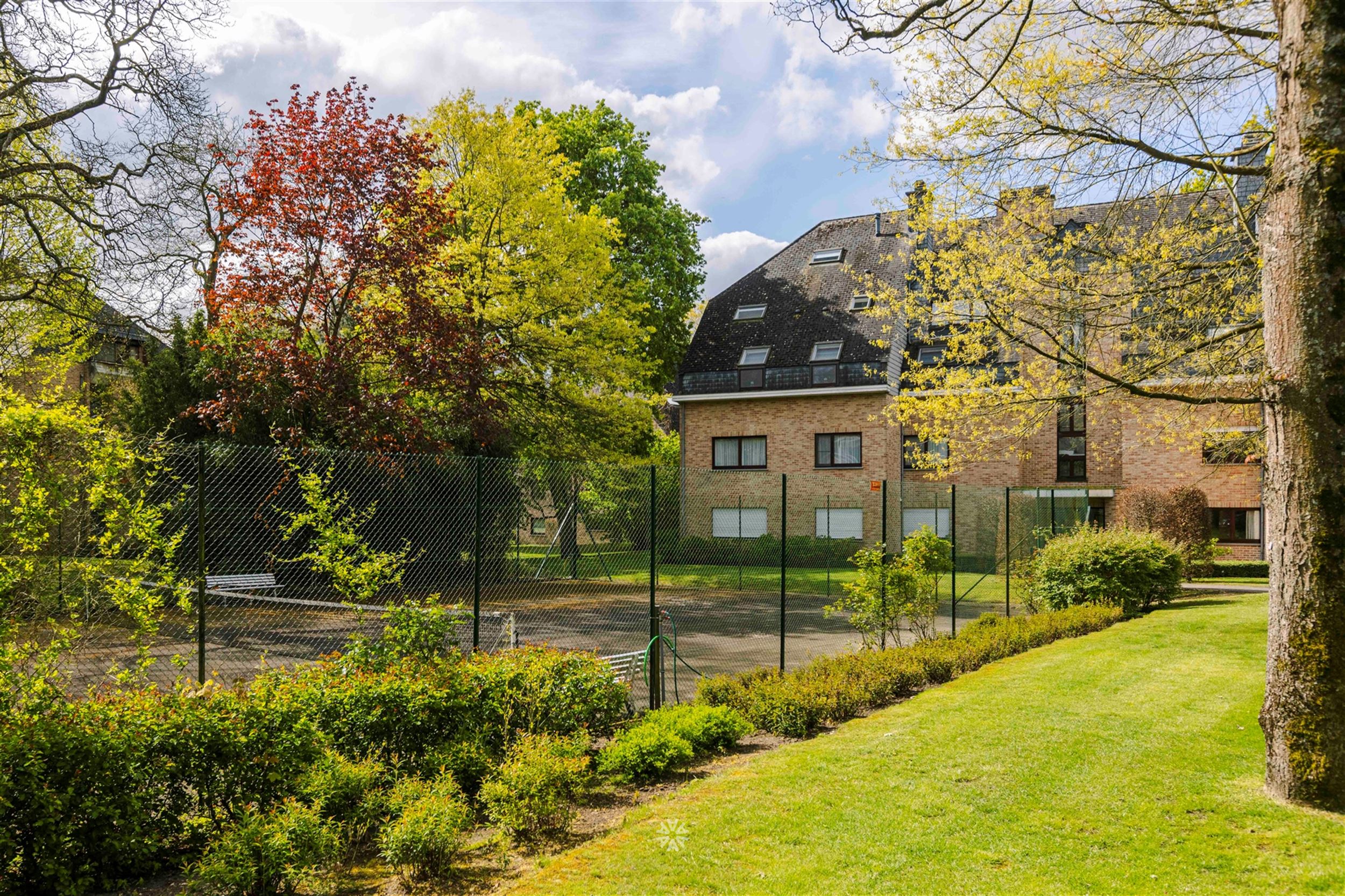 Gelijkvloers appartement met terras op exclusief domein te koop in Heusden foto 1