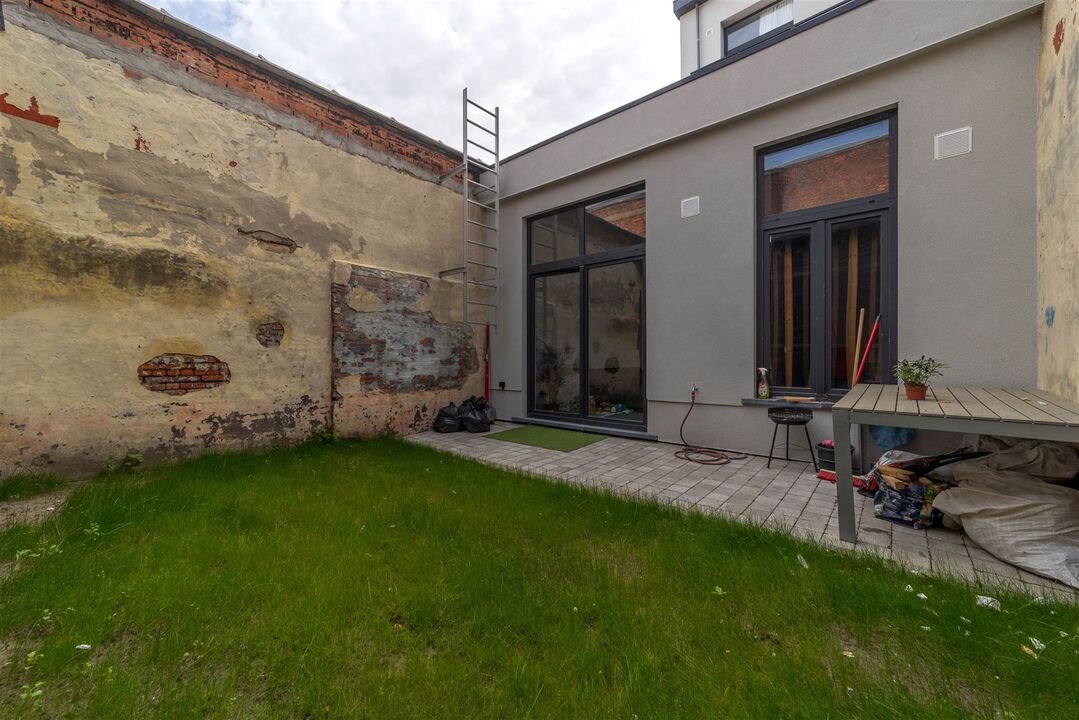 Gelijkvloers appartement (89m²) met tuin te Merksem foto 1