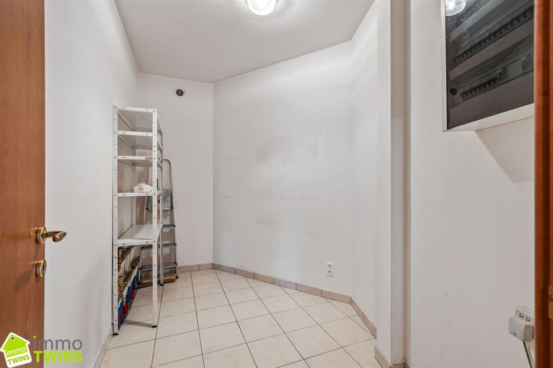 Uiterst ruim appartement 259m² in het centrum van Lebbeke foto 32