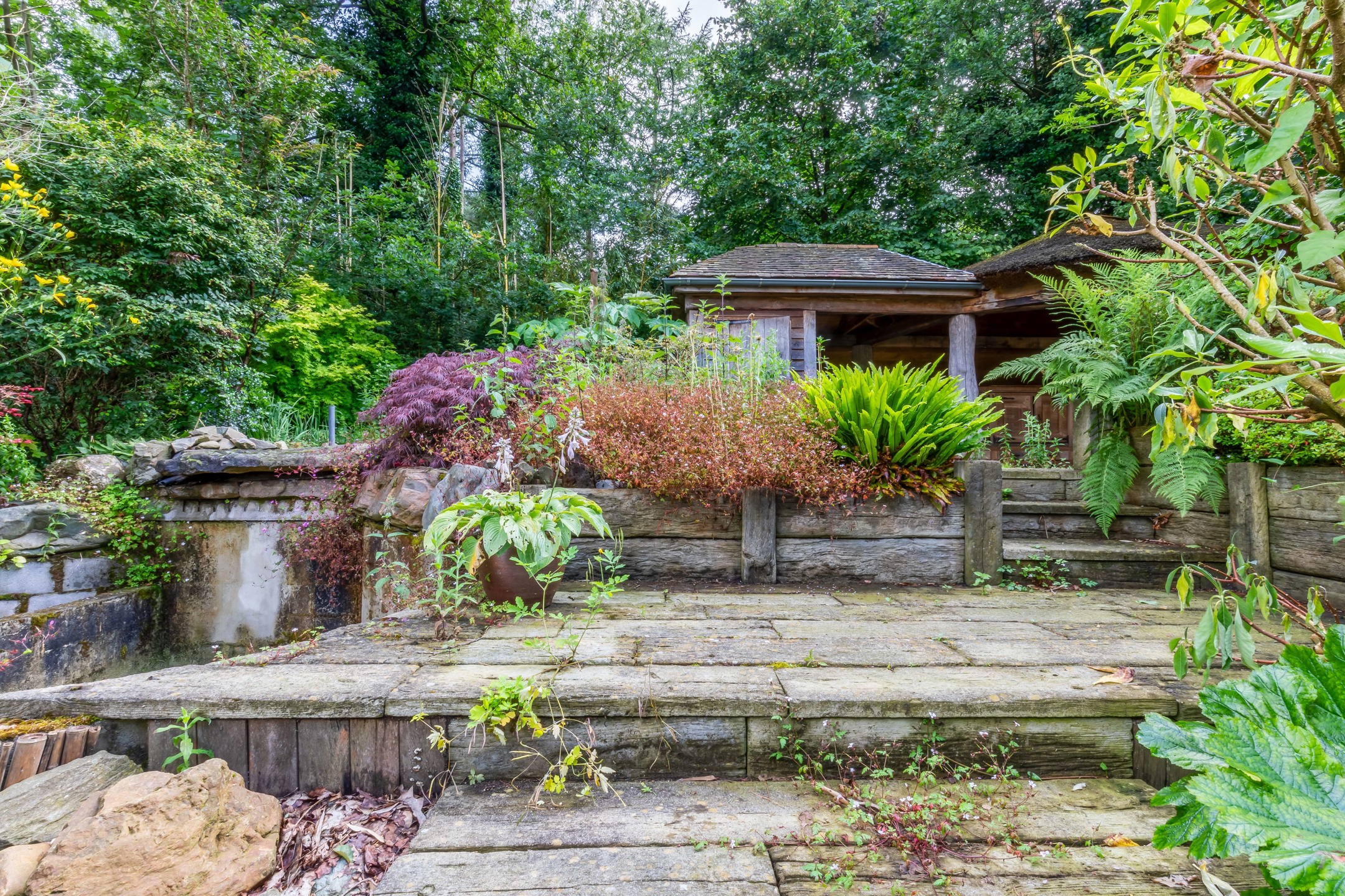 Bouwgrond met Exotische Tuin en Vele Mogelijkheden foto 24