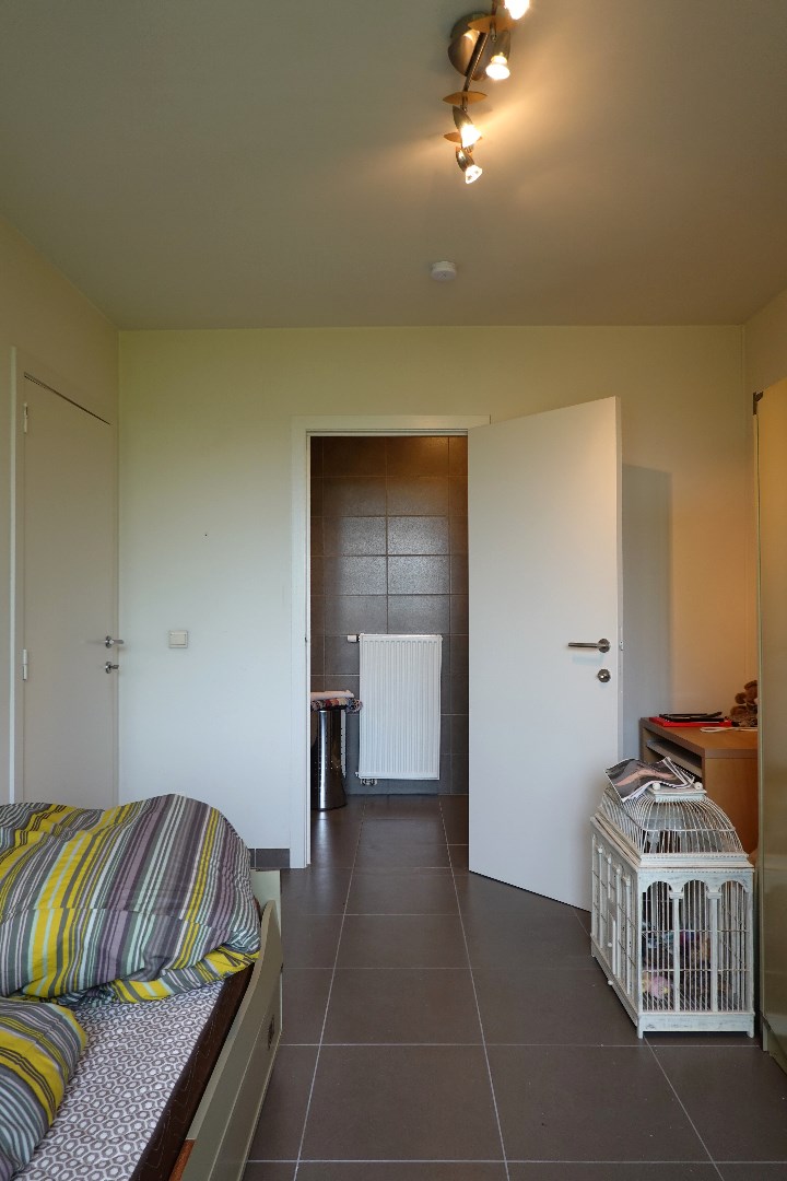 Lichtrijk en ruim appartement in centrum Gistel met twee slaapkamers foto 11