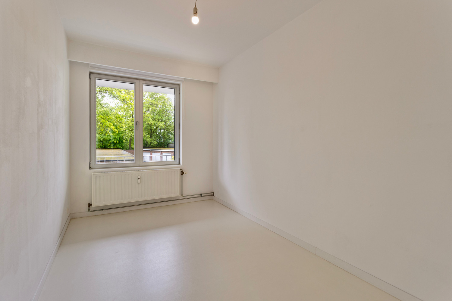 Instapklaar trendy appartement op wandelafstand van het Boekenberg Park met 3 slks, ruim terras en garagebox! foto 26