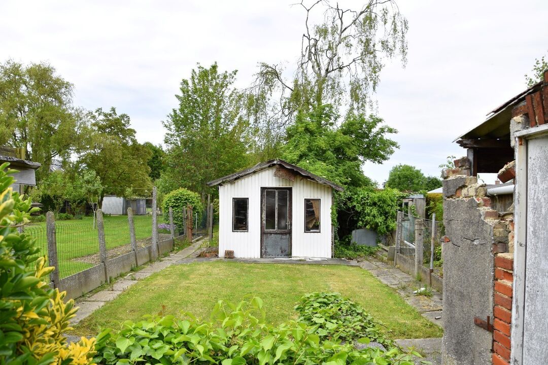 Te renoveren eigendom met 4 slaapkamers, garage en grote tuin te koop in Sint-Eloois-Winkel foto 17