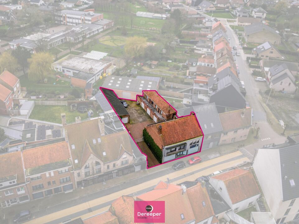 Op te frissen handelspand met woonst, garages en opslagruimte op een uitstekende locatie in centrum Oudenburg foto 2