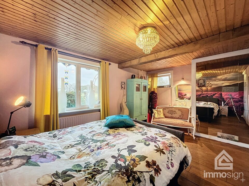 Gelijkvloerse woning met 4 slaapkamers in prachtige agrarische omgeving met optioneel extra weides foto 45
