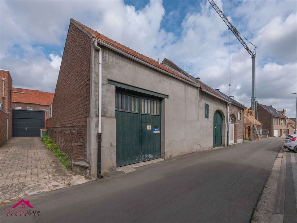 Zeer ruime woning in gesloten bebouwing, grotendeels gerenoveerd, met vrijstaande garage, in hartje Stokkem  foto 53