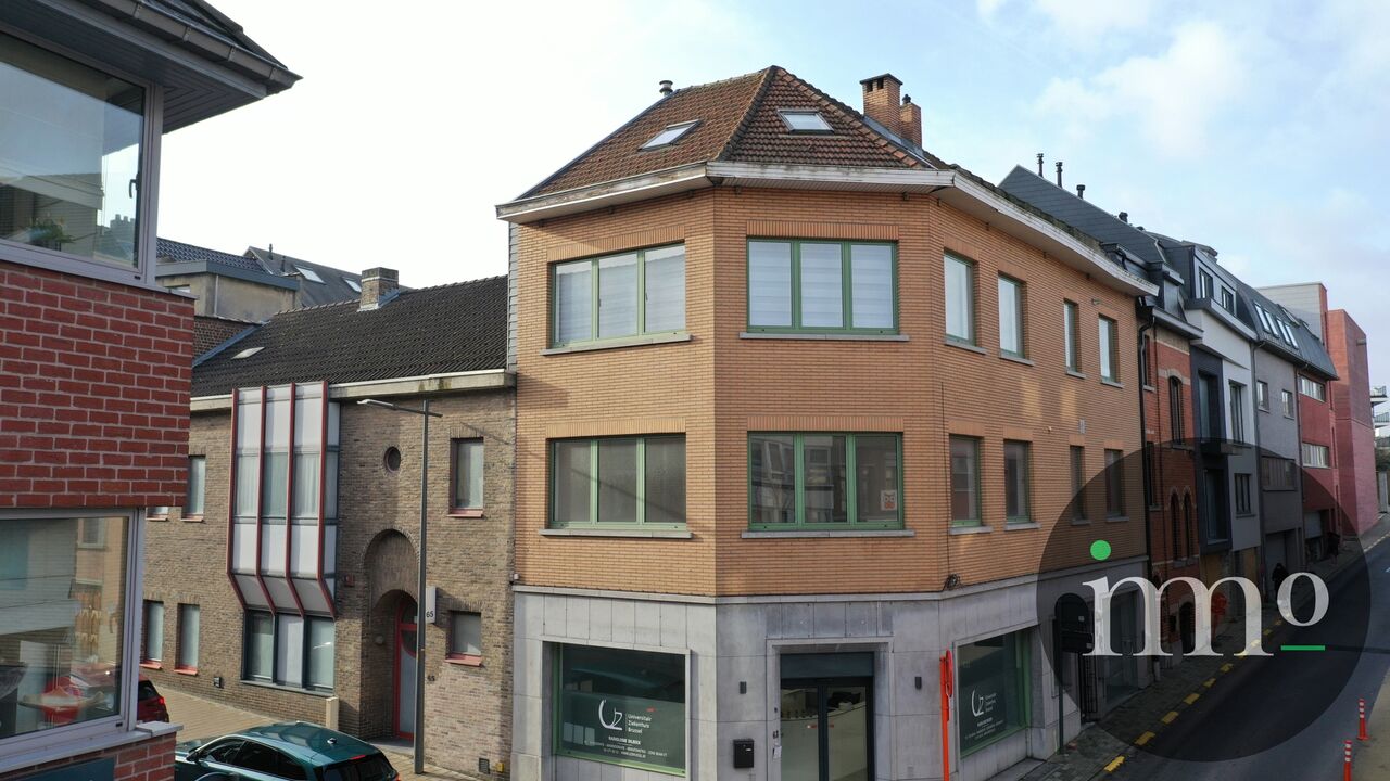 Appartement met Commerciele ruimte/Opslag/berging in. centrum Dilbeek foto 1
