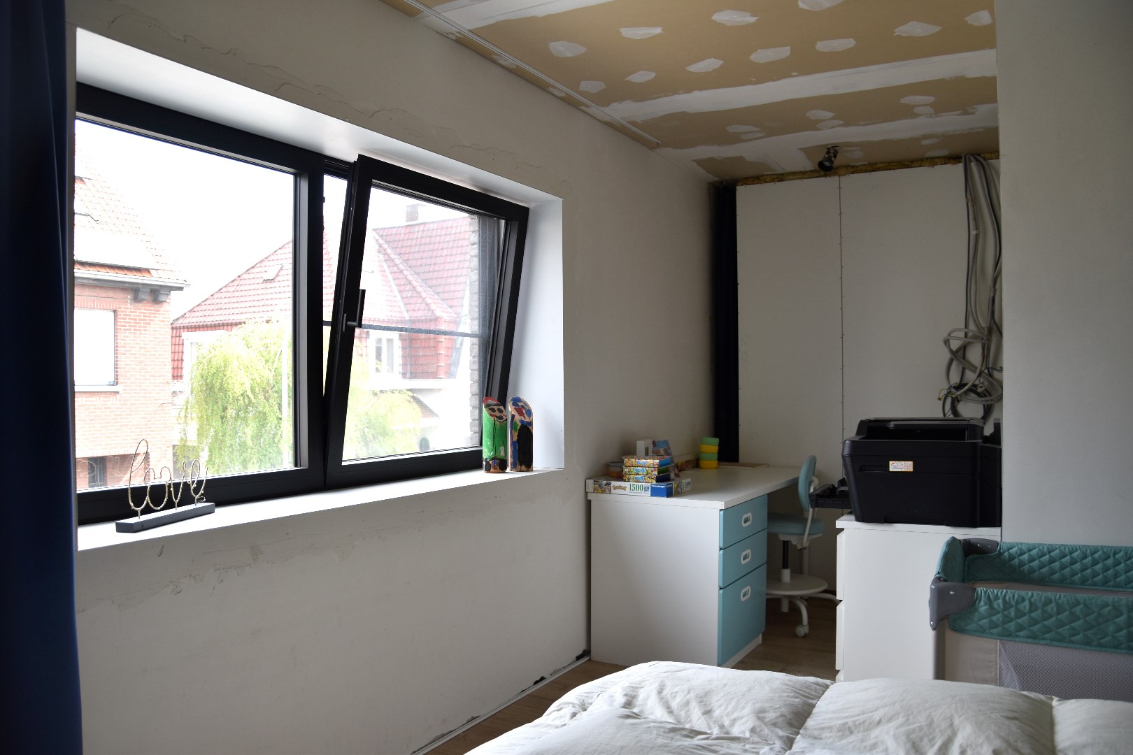 Gezinswoning met 4 slaapkamers, garage en grote zonnige tuin te koop in Rollegem foto 12