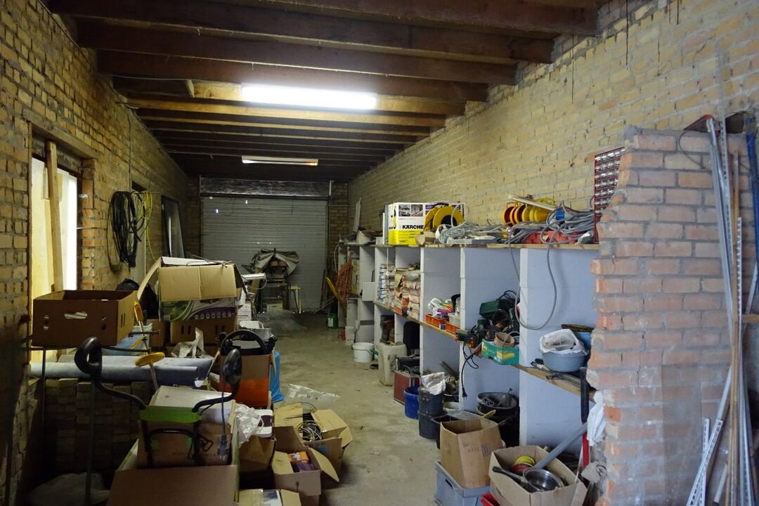 Op te frissen handelspand met woonst, garages en opslagruimte op een uitstekende locatie in centrum Oudenburg foto 25