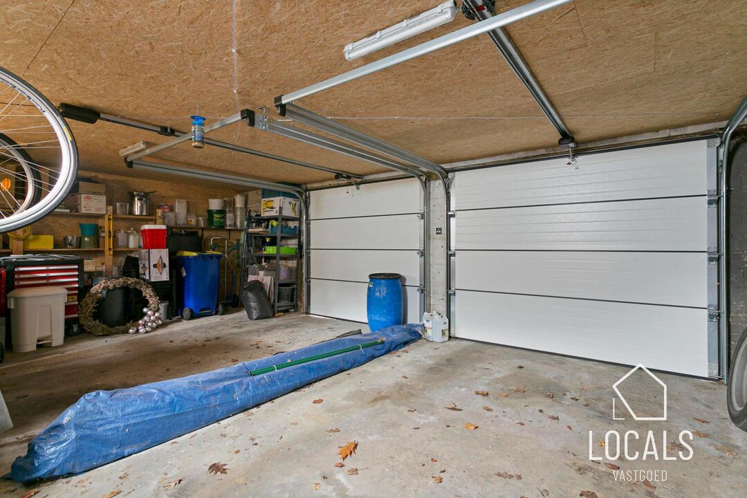 Multifunctioneel pand: handelsruimte, woonst & dubbele garage foto 29