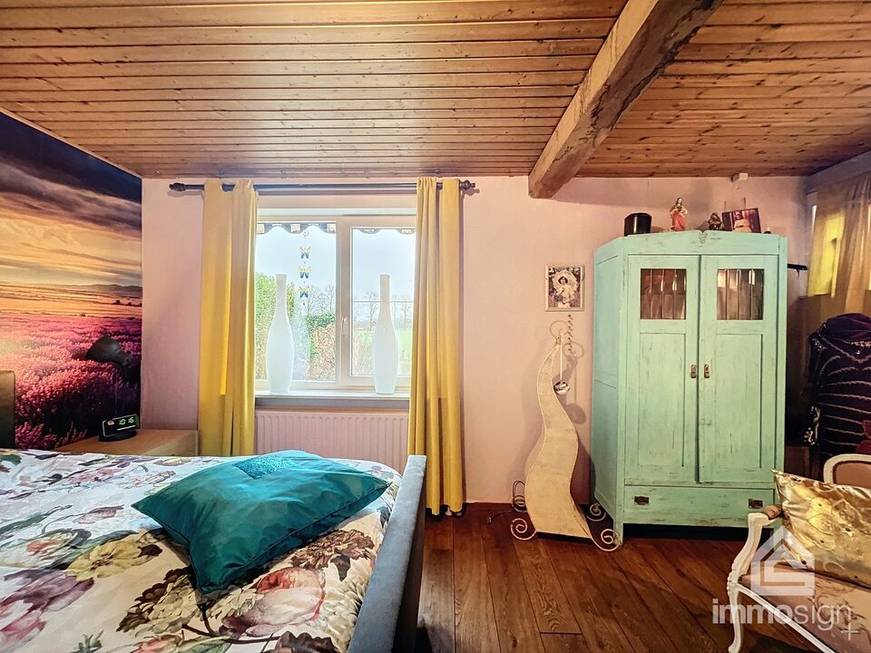 Gelijkvloerse woning met 4 slaapkamers in prachtige agrarische omgeving met optioneel extra weides foto 46
