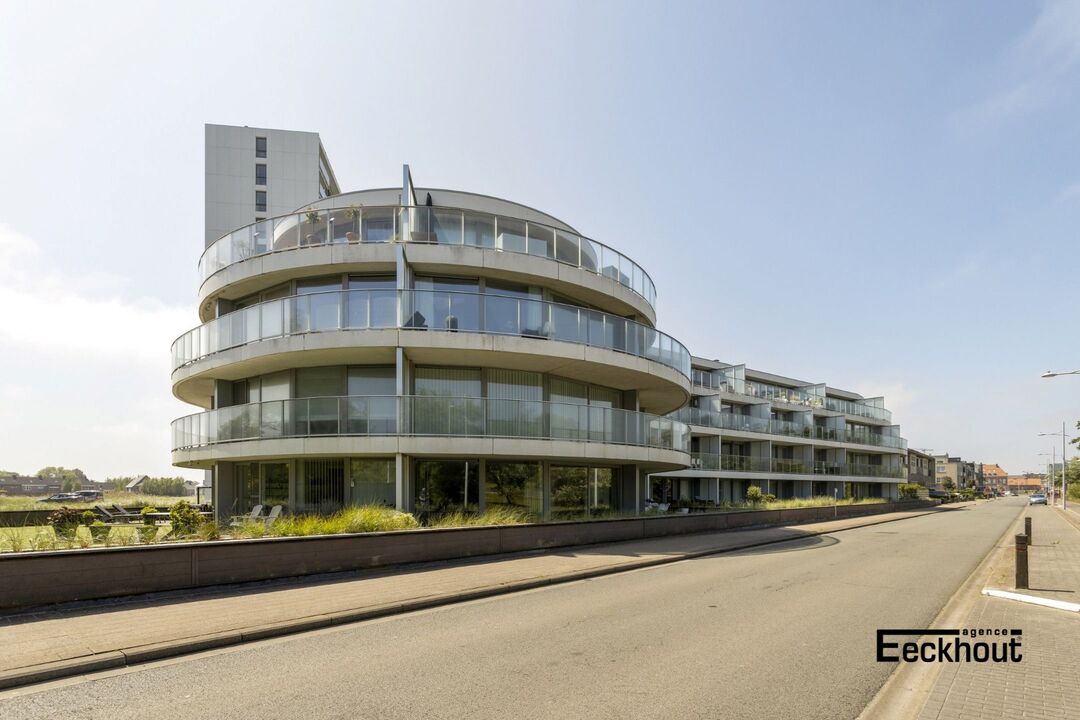 Modern & instapklaar appartement met mooie zonneterrassen en frontaal zicht op de duinen! foto 1