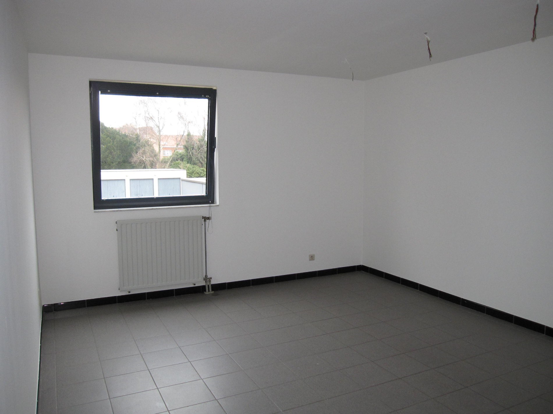 zeer ruim 3-slpk. appartement met garage foto 8