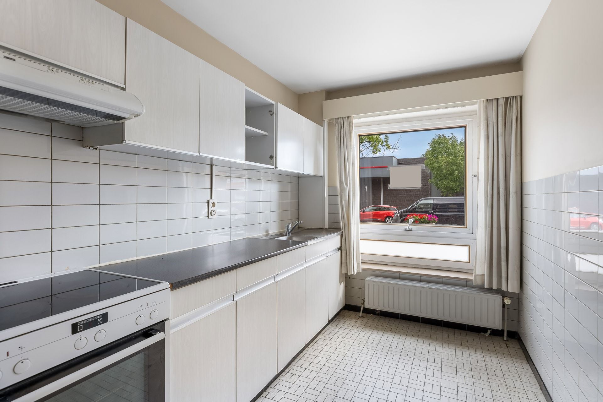 Ruim gelijkvloers appartement met 3 slaapkamers, garage én privé-tuin in het hartje van Klein-Vorst. foto 9