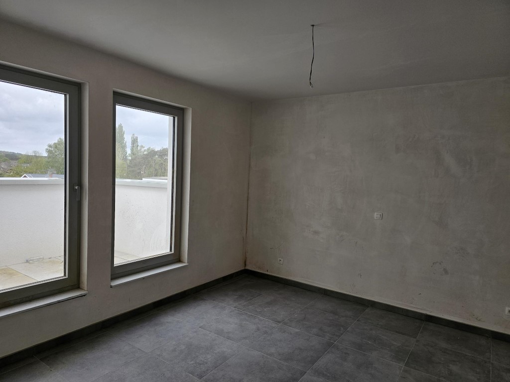 Ruim nieuwbouwappartement van 91 m² met ondergrondse autostaanplaats vlakbij het centrum van Maasmechelen. foto 7