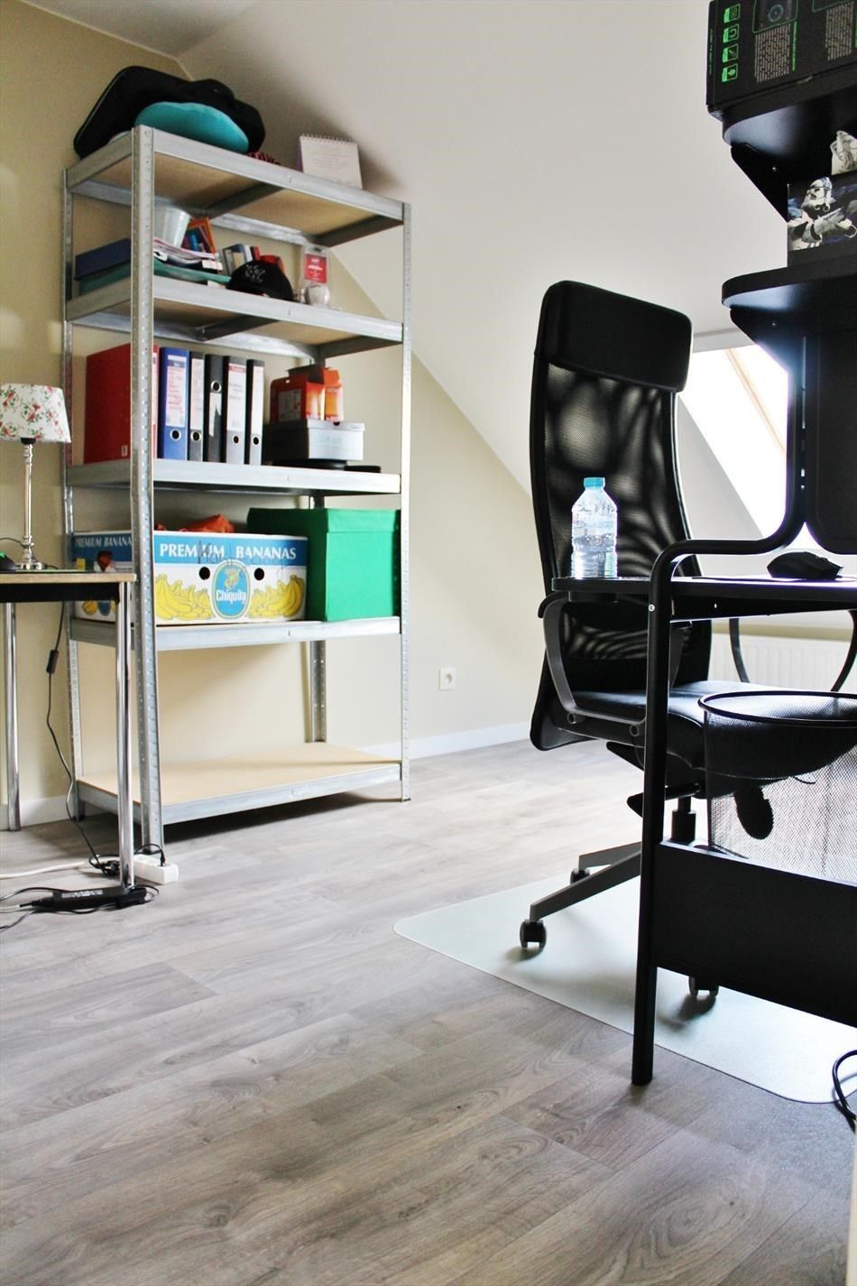 Vernieuwde centraal gelegen woning met 3 slpk + koer.  foto 11