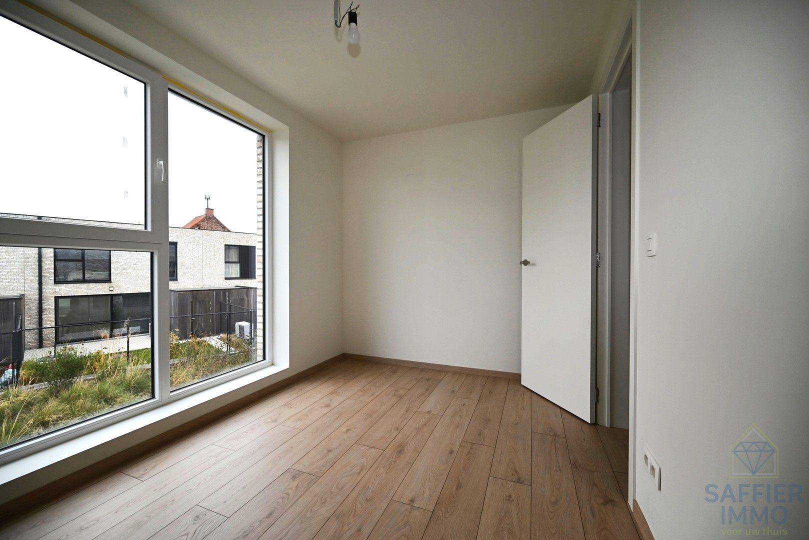 Nieuwbouwwoning te huur in het centrum van Wevelgem foto 22