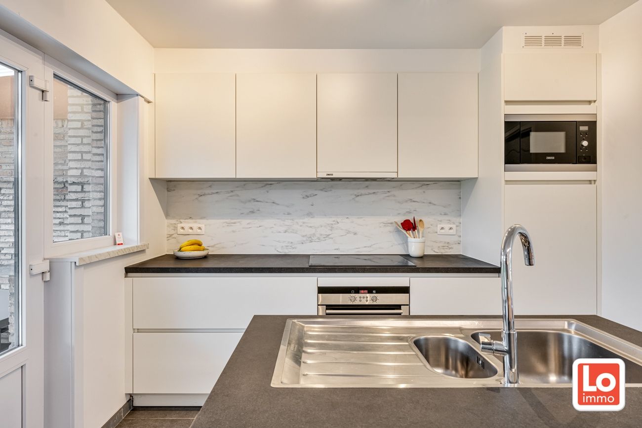 Instapklare gesloten bebouwing met garage op een rustige en goede locatie in wijk ‘Lobos’ nabij het centrum van Lochristi! foto 9