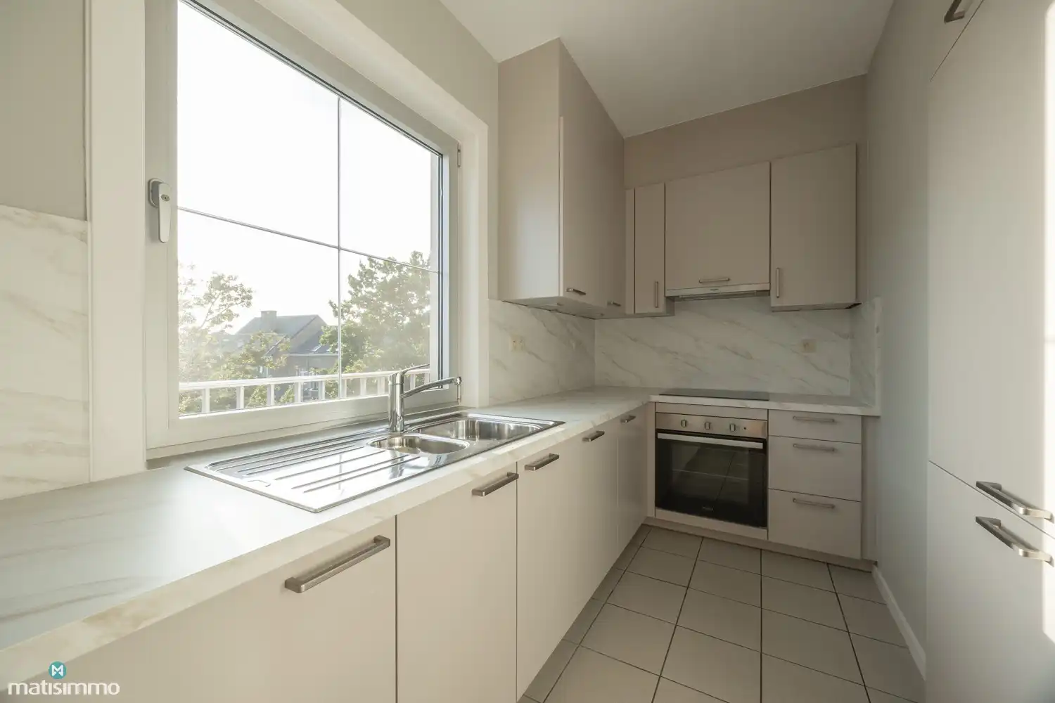 VERZORGD APPARTEMENT MET 2 SLAAPKAMERS, TERRAS EN AUTOSTAANPLAATS NABIJ HET CENTRUM VAN BILZEN foto 7