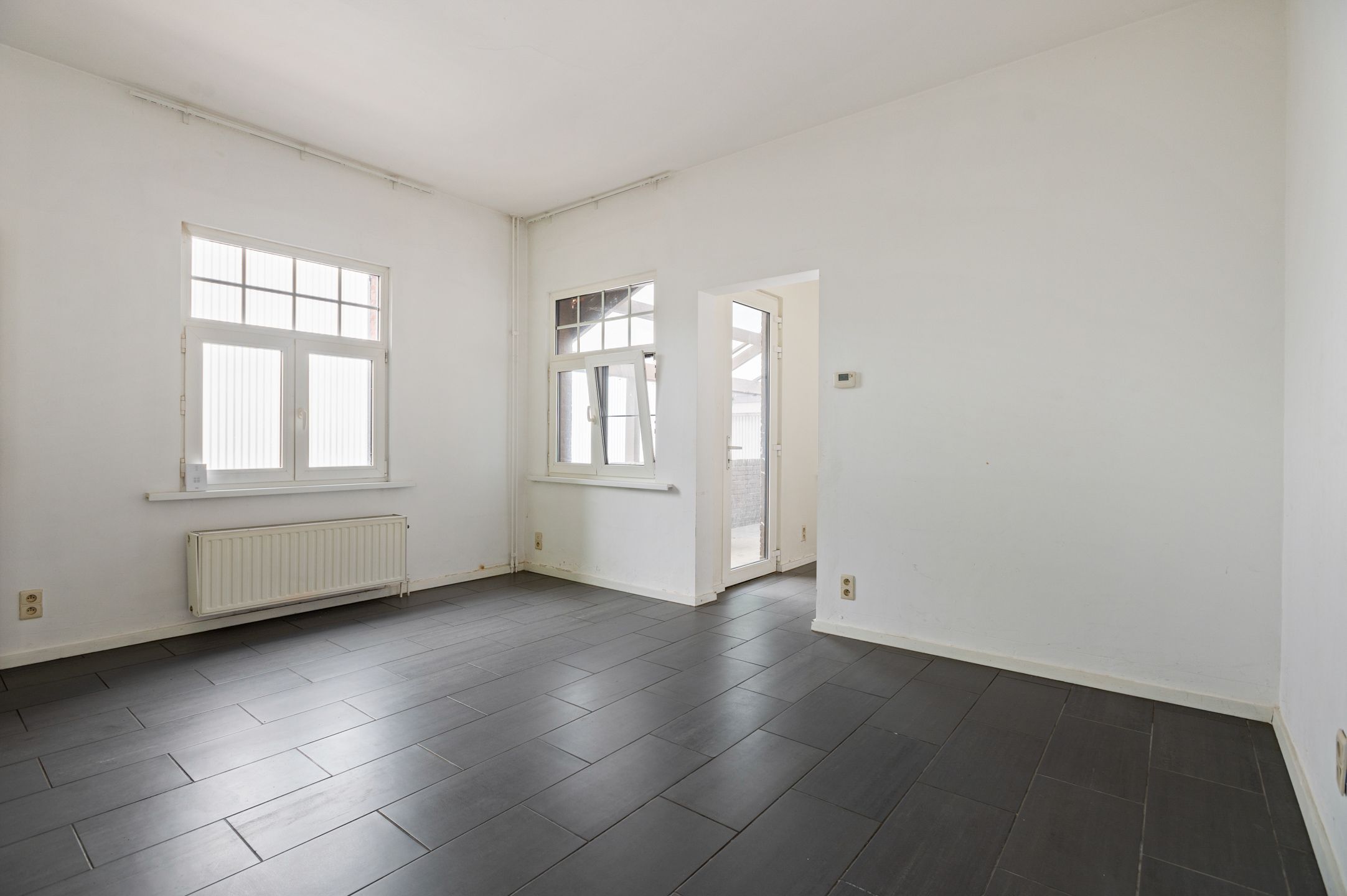 Halfopen woning met 2 slaapkamers en een grote tuin in Brasschaat te huur! foto 6