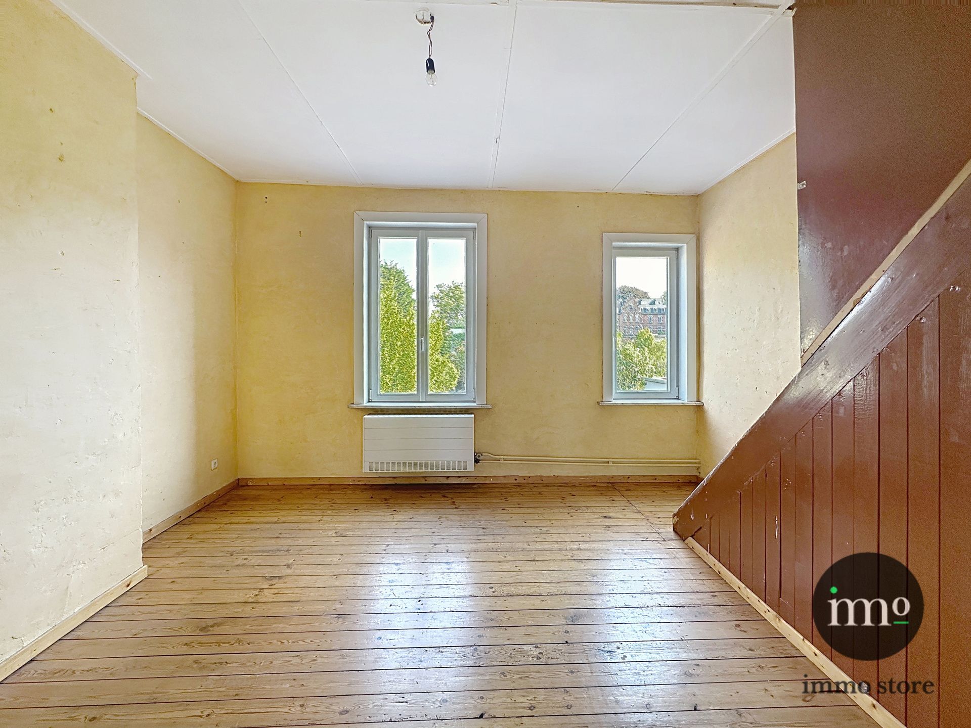 Deels te renoveren 3-gevel met mooie tuin en garage. foto 15