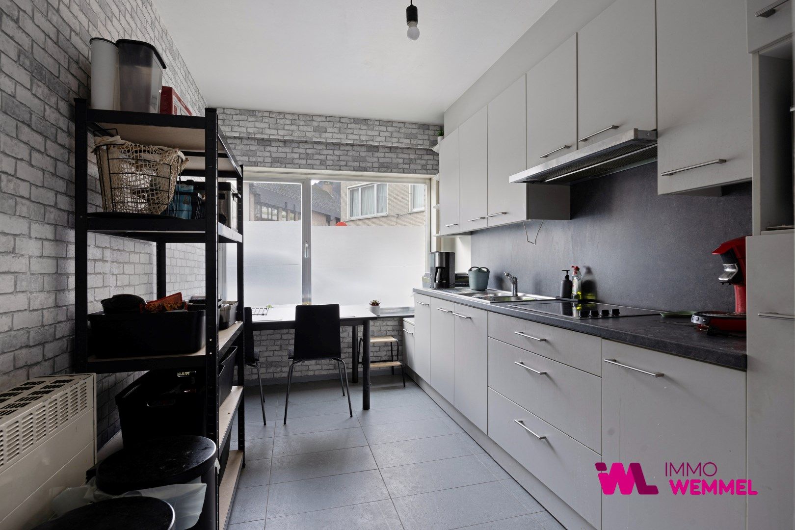 Gelijkvloersappartement met 2 slaapkames en kelder. foto 3