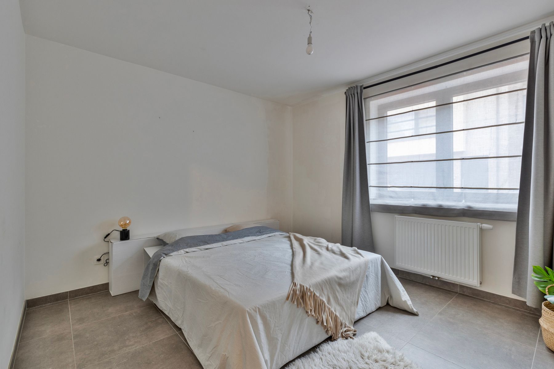Gelijkvloersappartement met autostaanplaats en tuin in centrum Zele foto 9
