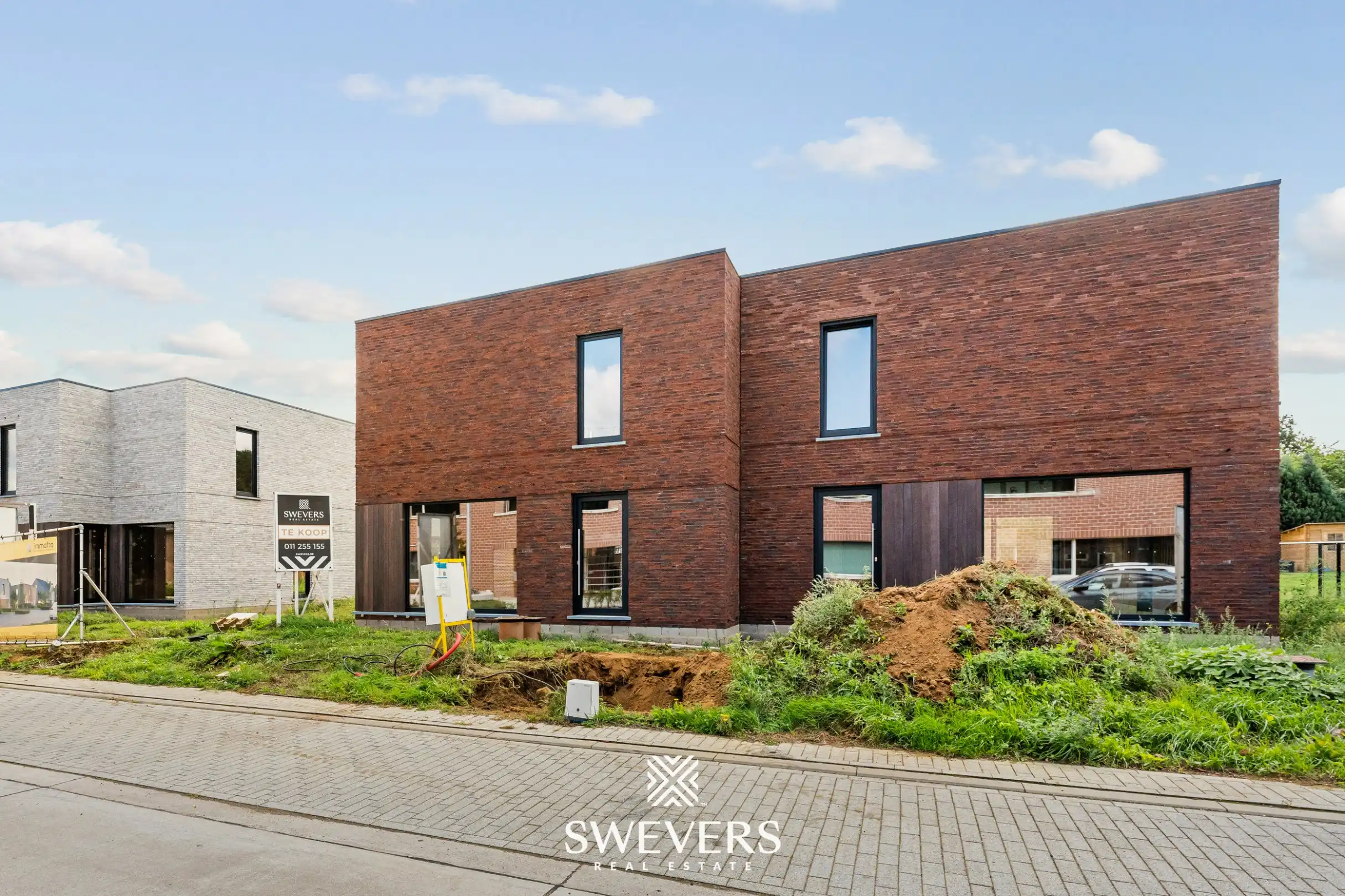 Exclusieve en energiezuinige halfopen bebouwingen in de Geneikenstraat te Lummen foto {{pictureIndex}}