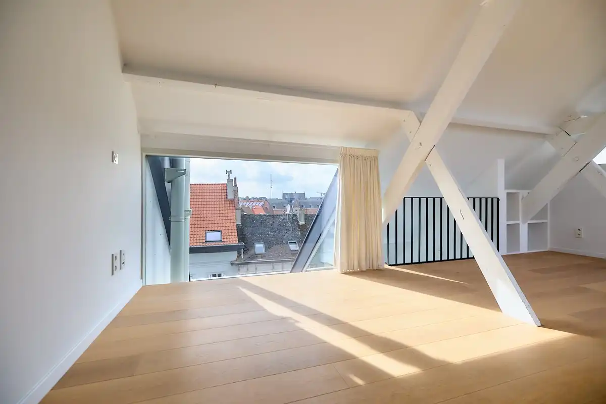 Exceptioneel en luxueus gerenoveerd 19e eeuws duplex dakappartement midden in de binnenstad. foto 13