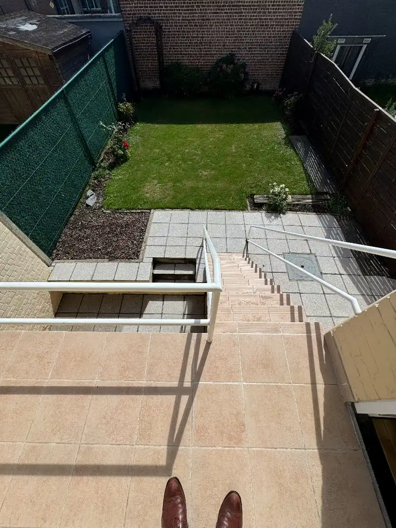 een woonhuis met tuin foto 12