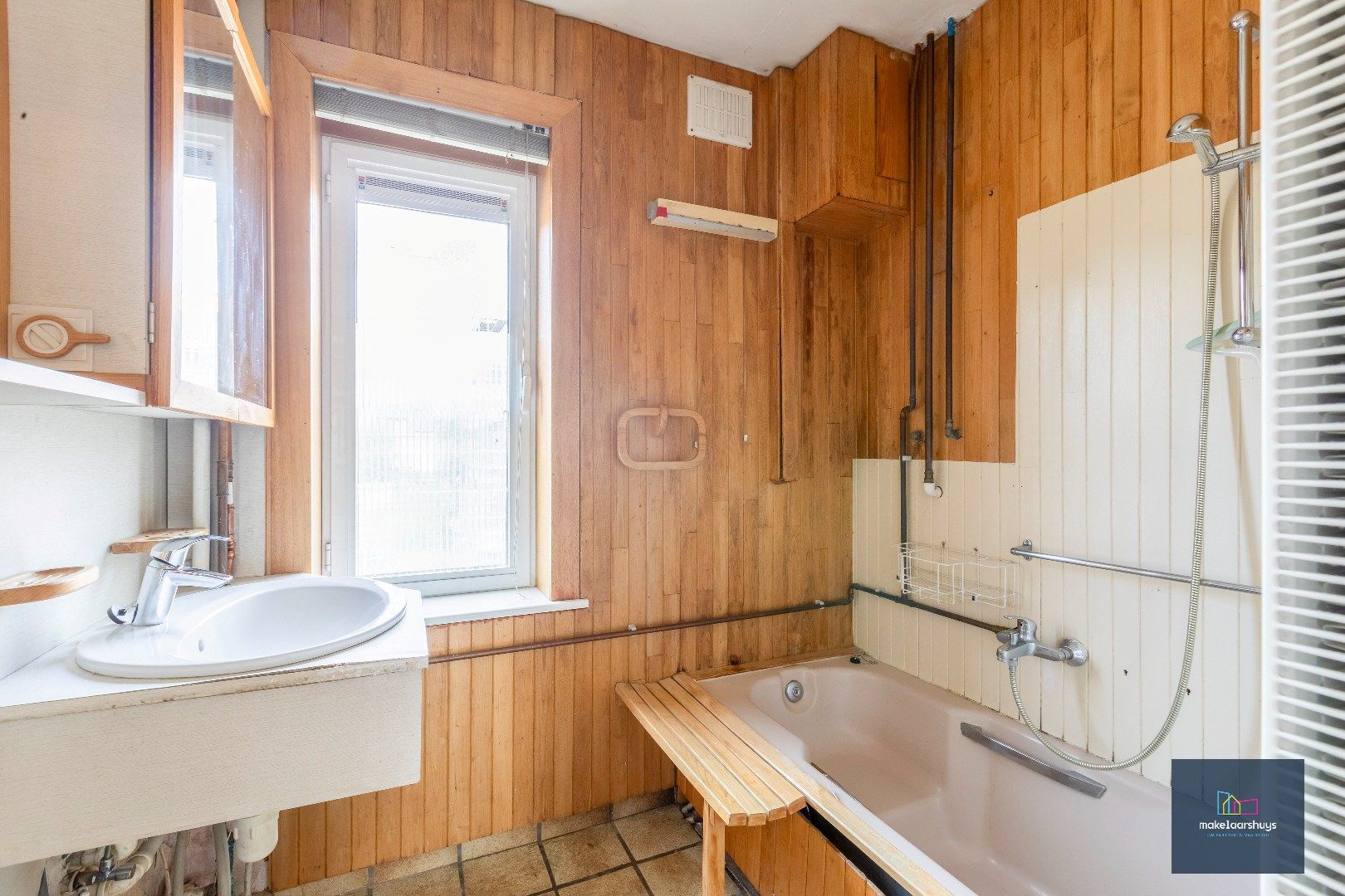 Gunstig gelegen woning met tuin en garage foto 16